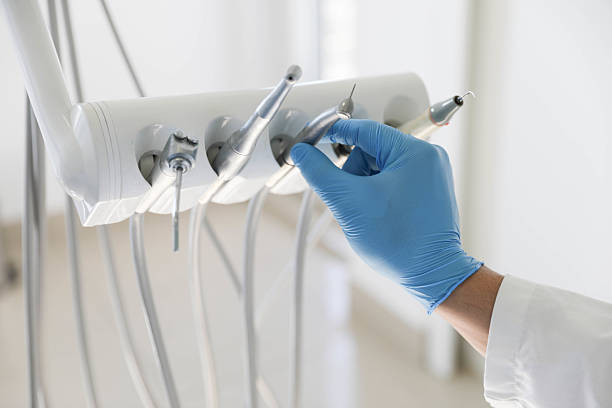 Professional Tooth Extraction technician working in Williston Park, NY